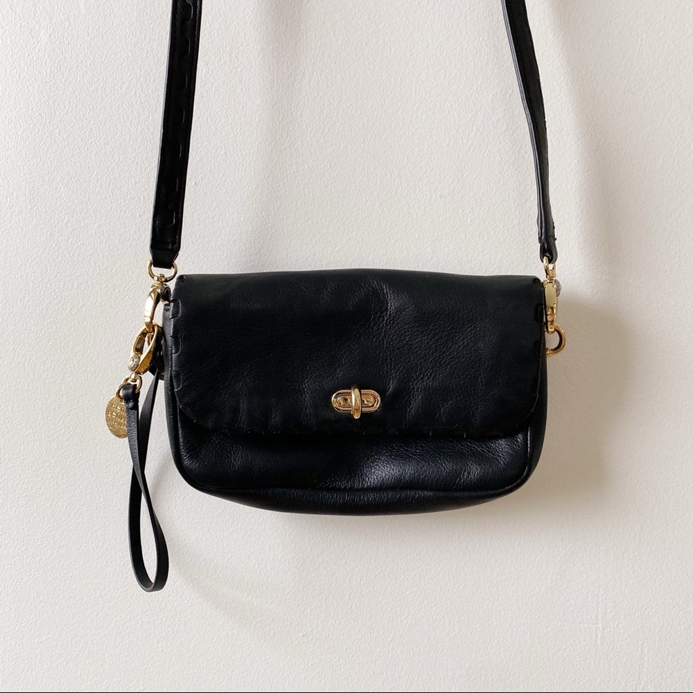 Henri Bendel black leather wristlet purse with gold clasp